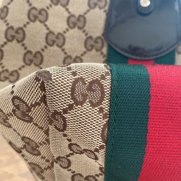 Authentic Gucci brown monogram canvas tote!With three charms.Near perfect! - Picture 5 of 14
